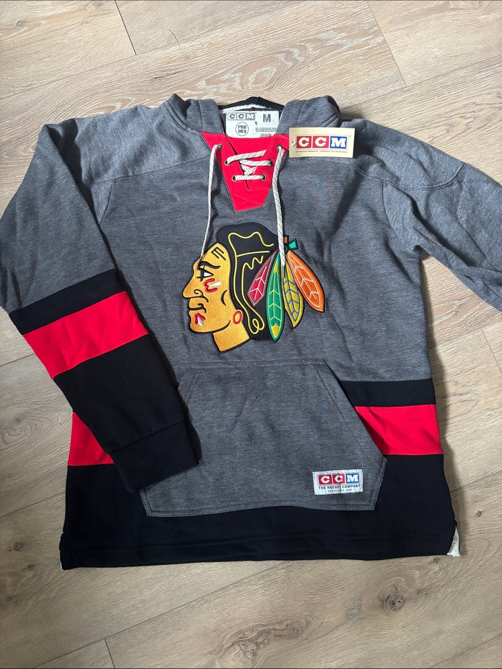 CCM Gray Sweatshirt with Red and Black Accents